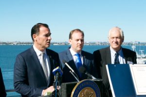 Rep. Tom Suozzi (speaking), Rep. Lee Zeldin and Assemblyman Steve Englebright (D-Setauket) at an event to promote protection of the Long Island Sound. (Photo by Luke Torrance)